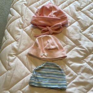 Three infant girl caps sold as a bundle